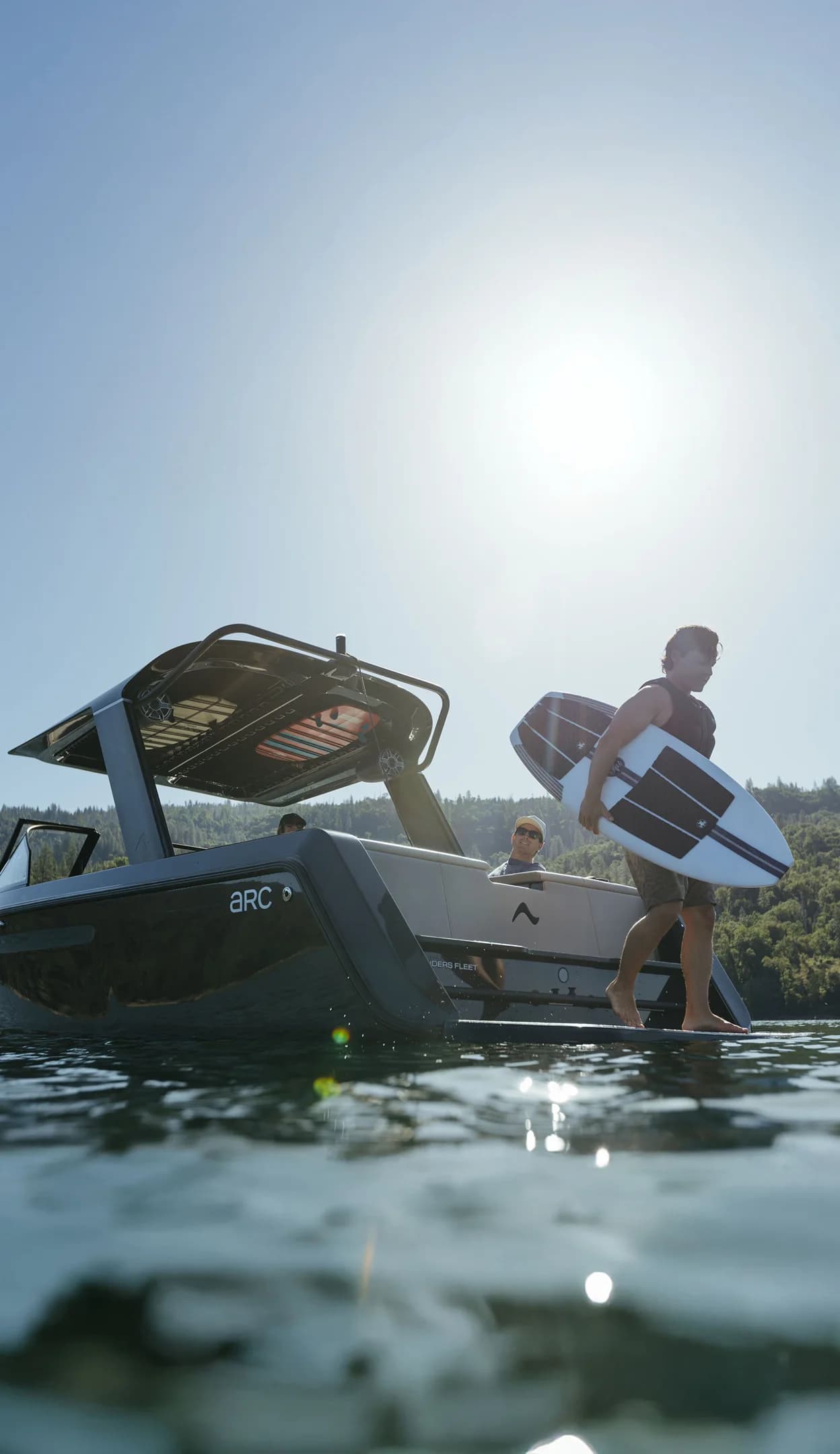 A photograph of an EV boat zipping through the water
